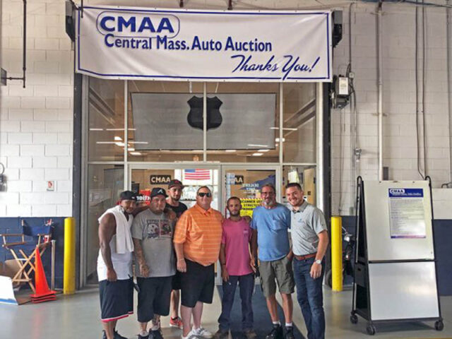 Impel team at the CMAA auction.